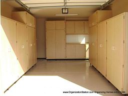 wrap around all 3 walls using various combination of different garage cabinet sizes